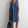 COS Nyheter | Utvald Denim*A-LINJESKUREN MINIKLÄNNING I DENIM