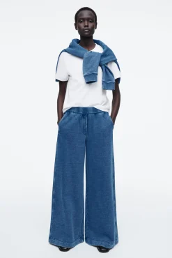 COS Byxor | Matchande Set*DENIMTVÄTTADE TRÄNINGSBYXOR I JERSEY