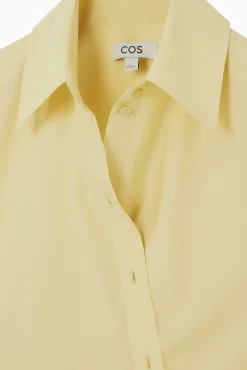 COS Skjortor & Blusar | Toppar*ÄRMLÖS OMLOTTSKJORTA I OVERSIZE-MODELL