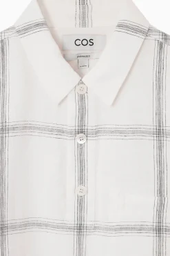 COS Linneplagg | Linnekollektionen*RUTIG OVERSIZE-SKJORTA MED HALV KNAPPSLÅ