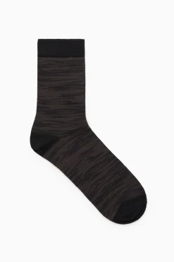 COS Strumpor & Strumpbyxor*STRUMPA I JACQUARD MED ZEBRAMÖNSTER